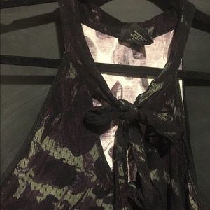 Sheer over lay sleeveless blouse